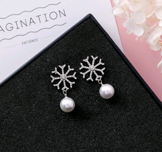 Wild diamond snowflake earrings